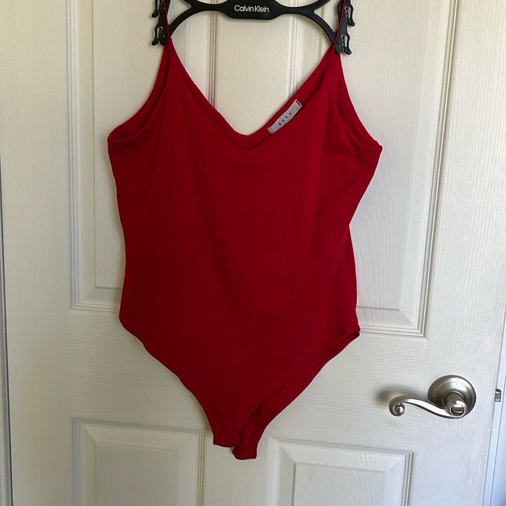 Red plunging neckline body suit